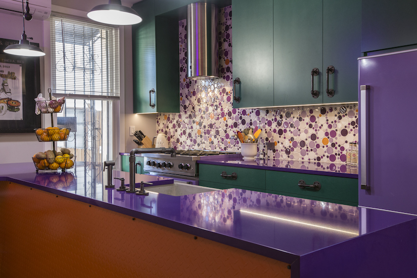 circular tile backsplash in orange and purple colors