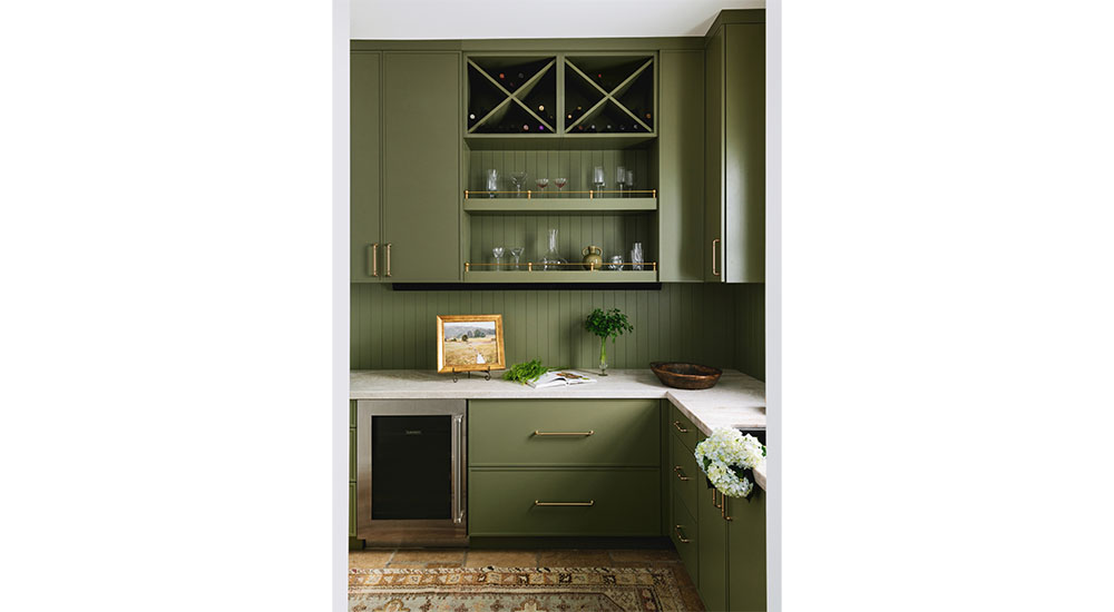 green cabinets in butler's pantry in English country kitchen