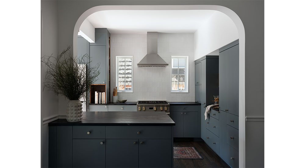 modern small kitchen dark blue cabinets
