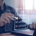 making checklists on laptop computer