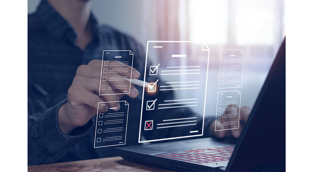 making checklists on laptop computer