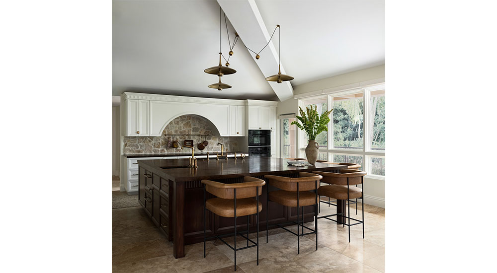 castle kitchen island and beam on peaked ceiling