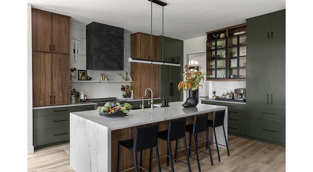 modern kitchen with dark cabinets and waterfall island