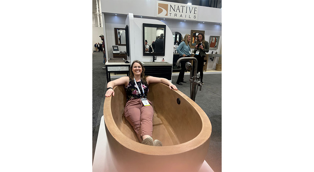 woman in bathtub at kbis trade show human connection human 