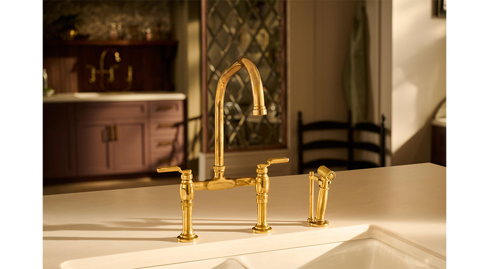 Brizo®_Faircroft™ Kitchen Collection_Deck Mount Bridge Kitchen Faucet with Side Spray with with Industrial Lever Handle_Unlacquered Brass (Patina)