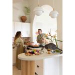 hawaii surfer kitchen peninsula with cat and dog