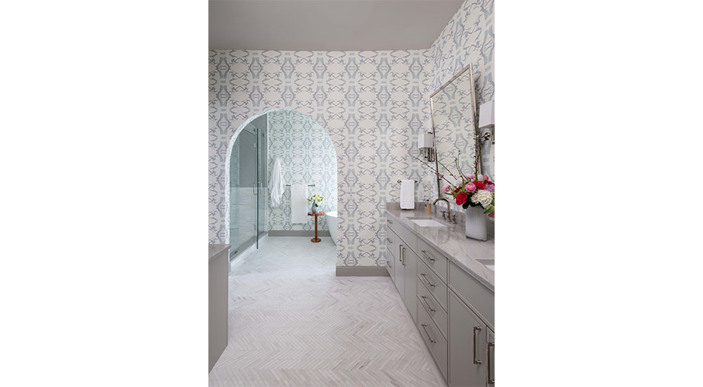 primary bathroom with arched door