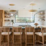 organic modern kitchen with fluted cabinets