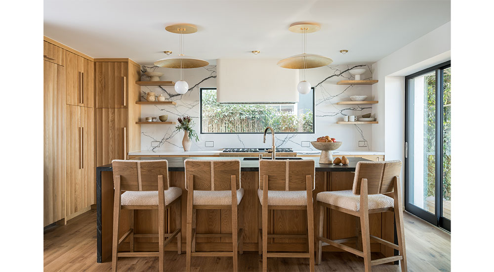 organic modern kitchen with fluted cabinets