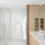 modern primary bathroom in penthouse
