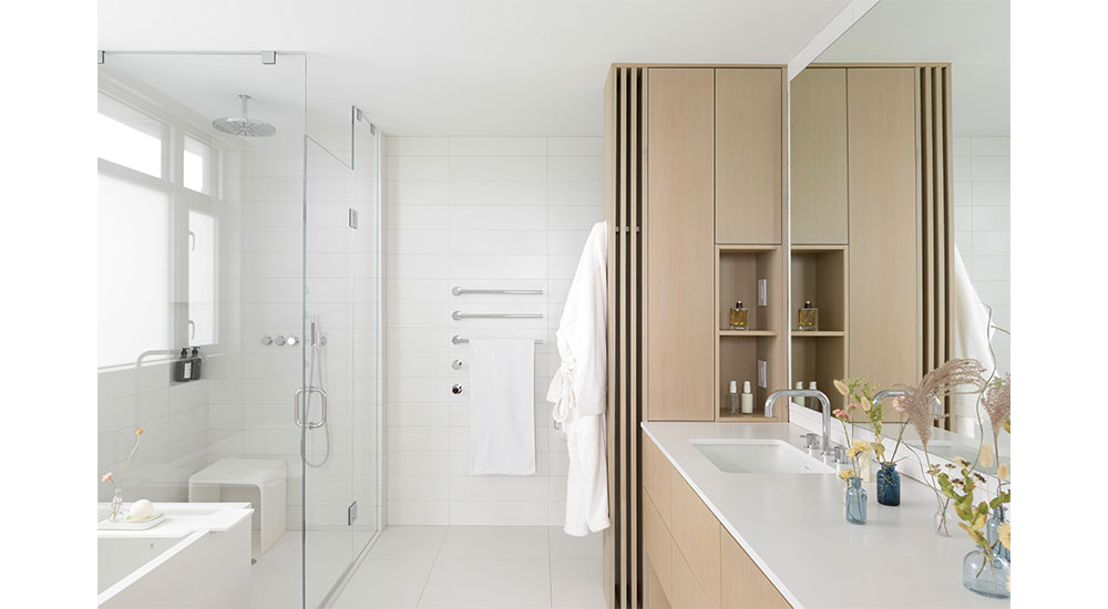 modern primary bathroom in penthouse