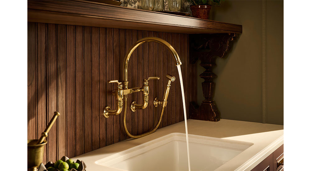 Brizo faircroft wall mount kitchen faucet in brass with side spray