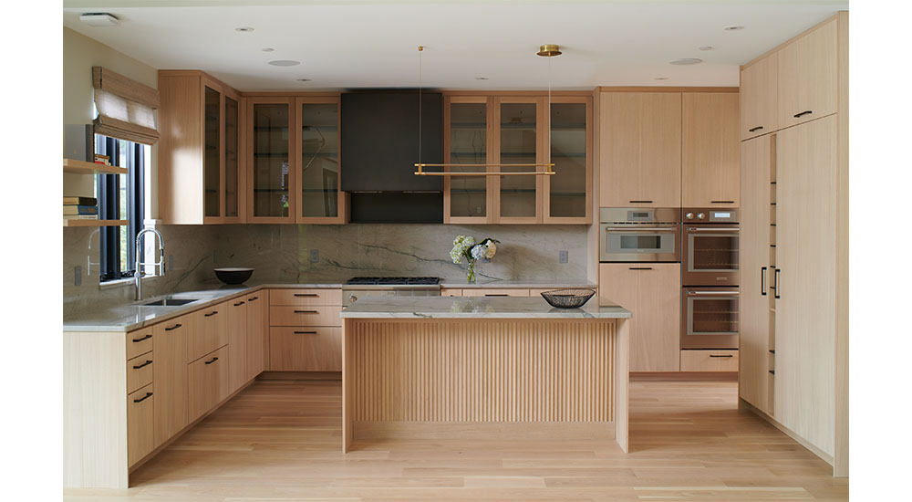 modern wood kitchen with island and glass cabinets