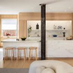 modern new york city kitchen with white marble island