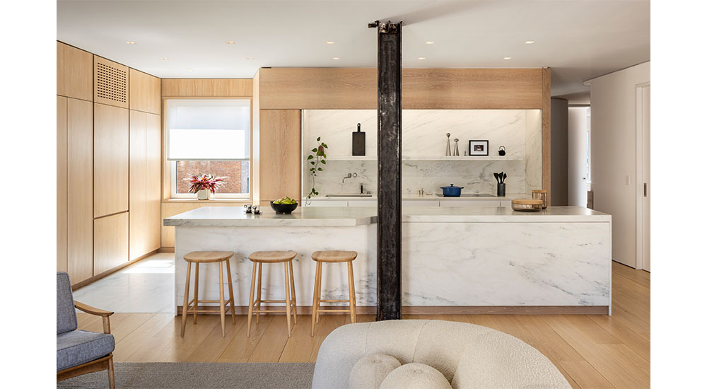 modern new york city kitchen with white marble island