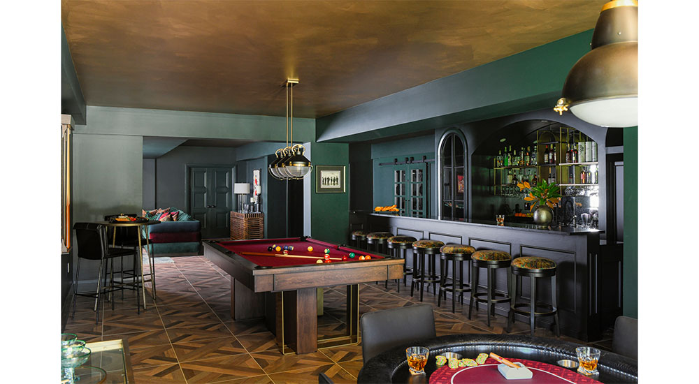 basement bar with pool table and gold ceiling