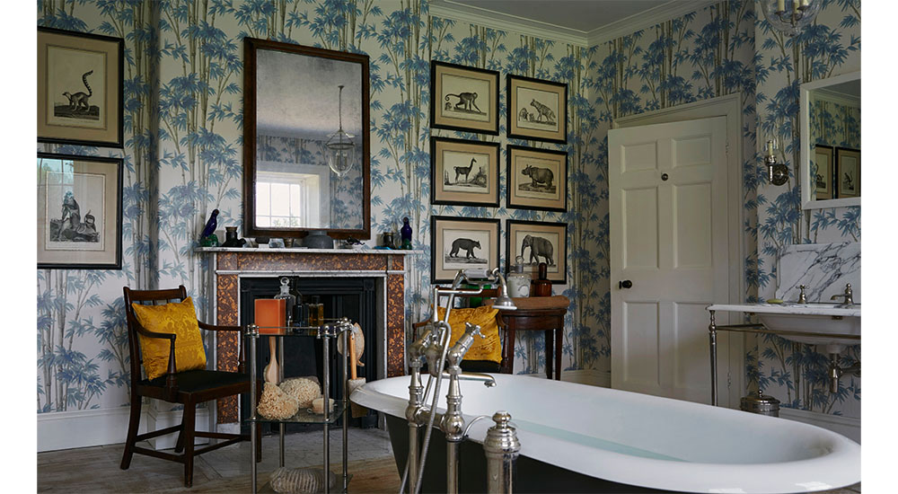 decorated bathroom with freestanding tub