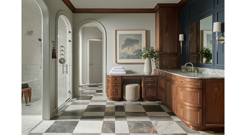 view through arch-top doorways in remodeled bathroom with a new traditional design