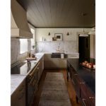 1920s Wilmington kitchen remodel with dark green painted ceiling and la cornue range